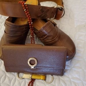 Bvlgari wallet, key chain and the shoes ,belt.